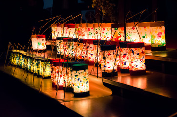 Rows of lit handmade paper lanterns in church crafted by kids for celebration of Saint Martins Day observed in Austria Germany Switzerland