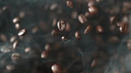 Fototapete - Super slow motion of flying coffee beans in speed ramping. Filmed on high speed cinema camera, 1000 fps.