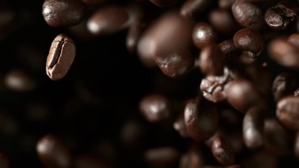 Aufkleber - Super slow motion of flying coffee beans in speed ramping. Filmed on high speed cinema camera, 1000 fps.