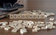 The concept of Astounded represented by wooden letter tiles