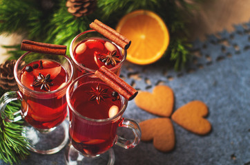 Christmas mulled red wine with spices, oranges and cinnamon. Hot, delicious drink.	