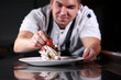 © Alla - The chef is preparing a dessert. I am preparing work in a restaurant of cuisine. Cooking concept. Out of focus. Photo without a face.