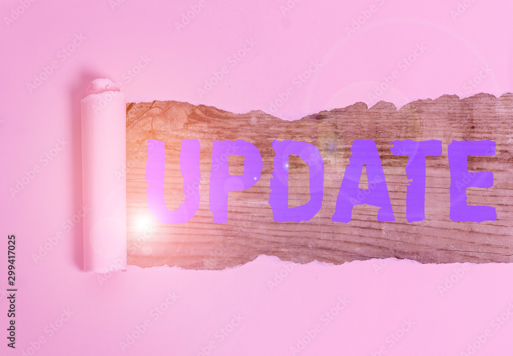 Update One Written Writing note showing Update. Business concept for make something more ...