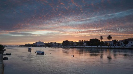 Wall Mural - Breathtaking Sky at Dusk Time-Lapse Guadalete River Puerto de Santa Maria