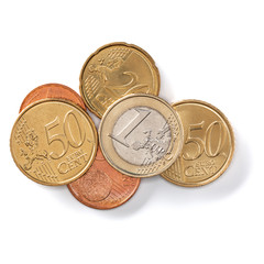 Euro coins isolated on white background closeup. Money concept. Top view, flat lay.