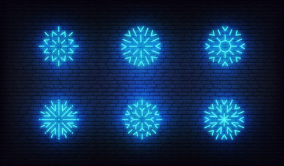Wall Mural - Snowflake icons neon. Vector glowing neon blue snow icons