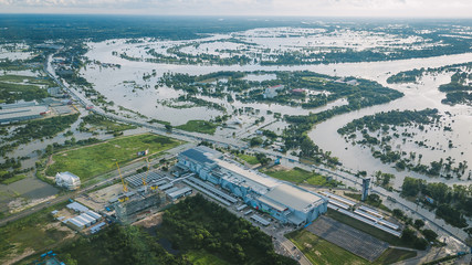 Wall Mural - High-angle view of the Great Flood, Meng District, Ubon Ratchathani Province, Thailand, on September 10, 2019, is a photograph from real flooding. With a slight color adjustment