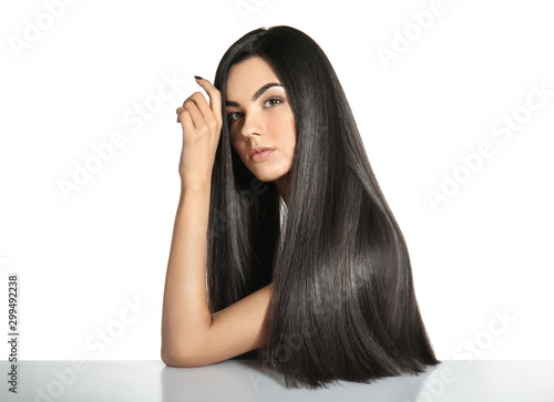 Fotografía Portrait of beautiful young woman with healthy long hair on white background