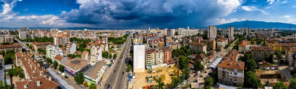 Obraz na płótnie Amazing aerial panorama from a drone of city Sofia with stormy clouds, Bulgaria w salonie
