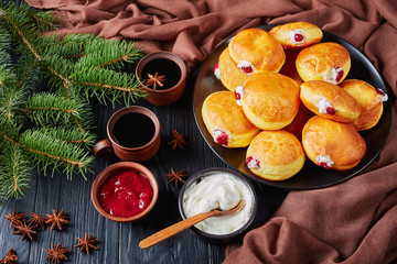 Wall Mural - berliner, tasty German Donuts with Raspberry Jam