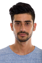 Studio Shot Of Face Of Young Persian Man