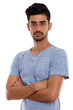 © Ranta Images - Studio shot of young Persian man with arms crossed