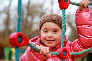 Wall Mural - Portrait of beautiful girl on the playground