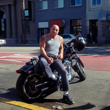 Portrait Of Man Sitting On Parked Motorcycle, Mission District