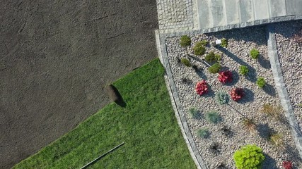 Wall Mural - Agriculture Industry. Aerial Footage of Turf Grass Installer. Gardening and Landscaping.