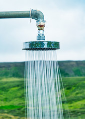 Canvas Print - Close up of shower in open air countryside