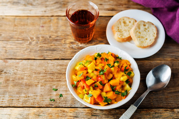 Pumpkin potato carrot stew in the bowl