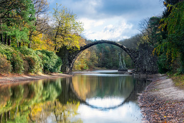   Rhododendron Park Kromlau, Germany, Europe. Incredible autumn view of Rakotz Bridge (Rakotzbrucke, Devil's Bridge)