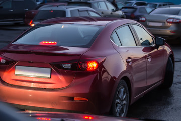 Canvas Print - Cars in a parking lot in the evening