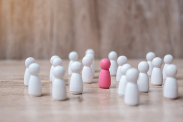 pink leader wooden from crowd of employees. People, Business, Human resource management, Recruitment, Teamwork, strategy and leadership Concepts