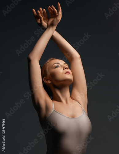 Sexy Gymnast In Ecru Bodysuit Gray Background Shot Stock Photo Adobe Stock