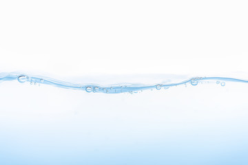 Water splash. Aqua flowing in waves and creating bubbles. Drops on the water surface feel fresh and clean. isolated on white background.