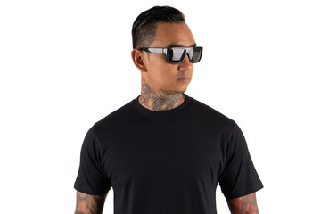 Wall Mural - Portrait of young man wearing black plain t shirt isolated on white background. Hipster man with tattoo wearing black t shirt. Ready for mock up design template or background