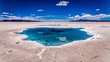 Salty water puddles on the salt flat of Salta, Argentina