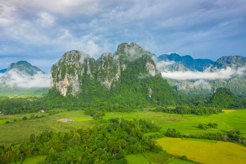 Wall Mural - Aerial view of beautiful landscapes at Vang Vieng , Laos. Southeast Asia. Photo made by drone from above. Bird eye view.