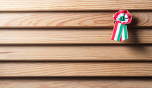 Hungarian Cockade On Wooden Seamless Background