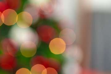 Wall Mural - Christmas tree illuminated garland light bokeh background