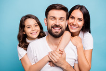 Close Up Photo Of Cheerful Content Three People With Cute Schoolkid Hug Lean Shoulder Cuddle Piggyback Enjoy Weekends Holidays Wear White Trendy T-shirt Isolated Over Blue Color Background