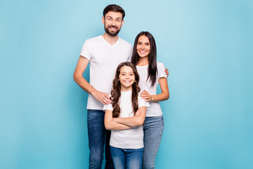 Canvas Print - Portrait of cheerful idyllic three brunette hair people big family feel confident cool hug have fun wear white t-shirt denim jeans isolated over blue background