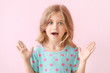 © Pixel-Shot - Surprised little girl on color background