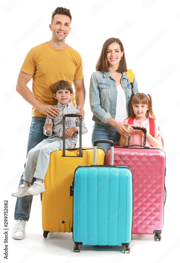 Happy family with suitcases isolated on white