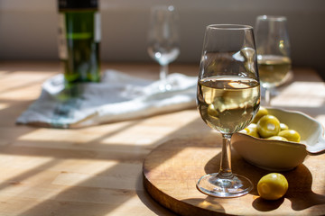 Sherry wine tasting, dry fino, manzanilla or palomino jerez fortified wine in glasses, Jerez de la Frontera, Andalusia, Spain