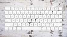 English Computer Keyboard Layout On Brick Background