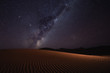 © robertharding - Milky way rising over sand dunes at night