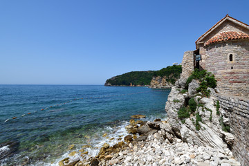 The Mediterranean Sea and fragment of architecture in Old Town in Budva, Montenegro