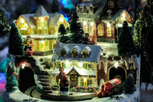 Christmas Time, Miniature Of Houses And People, Winter And Snow At Night, Xmas Houses Decorated With Lights 