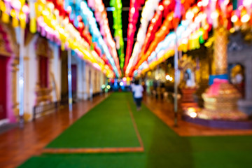 Wall Mural - Blurred background of Phra That Hariphunchai temple in Lamphun Lantern Festival at night