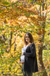 © Dmytro Surkov - Pregnant woman in the autumn park
