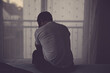 © fotografie-la.de - depressive man sitting on bed in agony