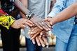© AS Photo Family - Group of five african college students spending time together on campus at university yard. Black afro friends studying. Education theme. Hands on hands.