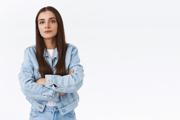 Offended serious-looking sulking brunette girl, cross hands over chest look arrogant and snobbish, standing insulted with upset, bothered expression, posing annoyed over white background