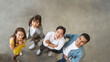 © saksit - Top view portrait of Asian creative business team. Hipster Creative Startup Young business people in modern office.