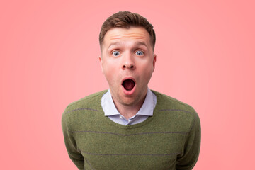 Wall Mural - Young man with a shocked facial expression