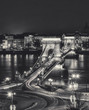 Széchenyi Chain Bridge illuminated at night in Budapest, Hungray black and white shot