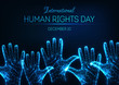 © Inna - Futuristic glowing low poly International human rights day banner with raised up open hands and text