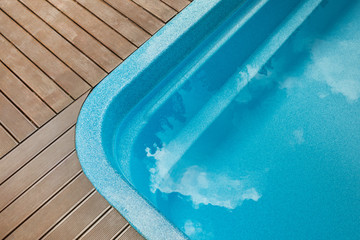 Part of the pool close-up, abstract geometry of the pool, fragments and details of the pool, pool bowl, top view, shape, lines.